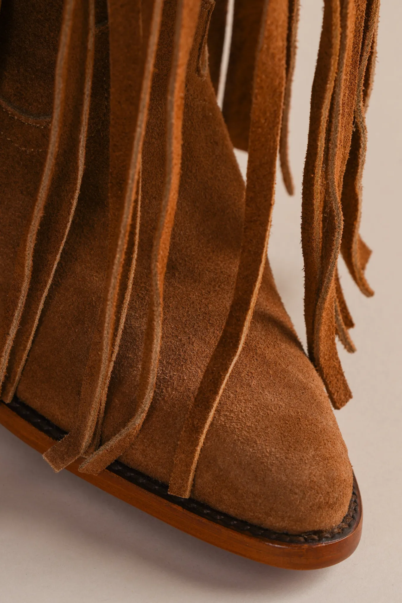 Fringe Atlas Boots In Suede
